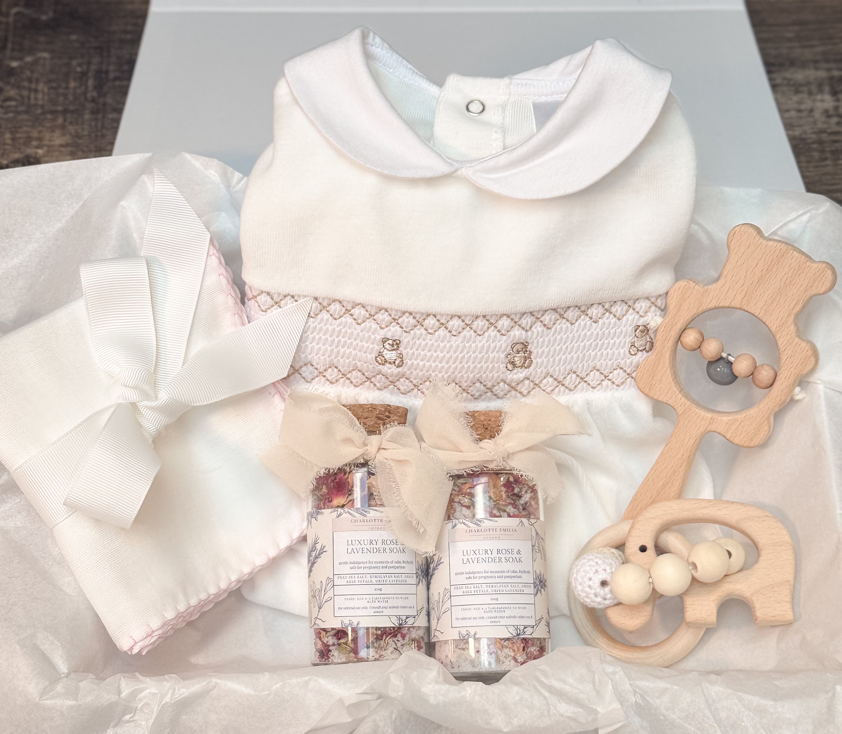 Luxury Mummy & Baby Gift Box – Wooden Rattle, Smocked Onesie & Rose Lavender Soak
