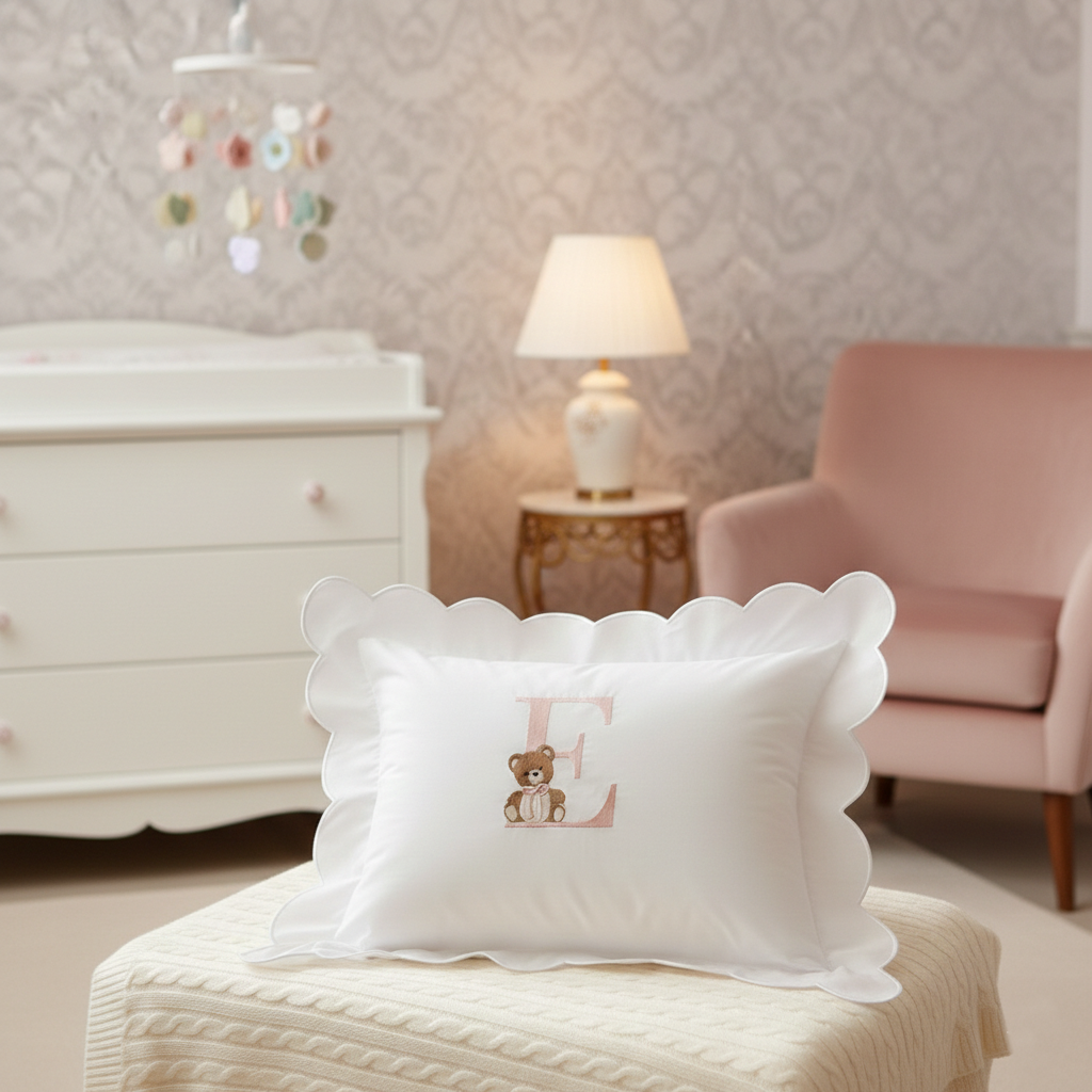 Personalised pink E monogram scalloped baby pillow with embroidered teddy bear	